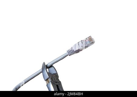 Braking internet cable with pliers Stock Photo