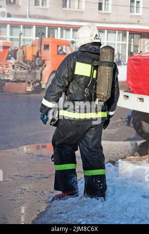 Firefighter on fire Stock Photo