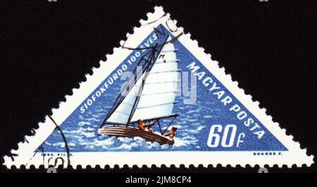 HUNGARY - CIRCA 1960s: A stamp printed in Hungary shows yacht Stock Photo