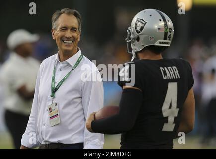 Canton, United States. 04th Aug, 2022. NBC Sportscaster Cris Collinsworth shares a laugh with Las Vegas Raiders quarterback Derek Carr (4) prior to the start of the Pro Football Hall of Game against the Jacksonville Jaguars in Canton, Ohio, on Thursday, August 4, 2022. Photo by Aaron Josefczyk/UPI Credit: UPI/Alamy Live News Stock Photo