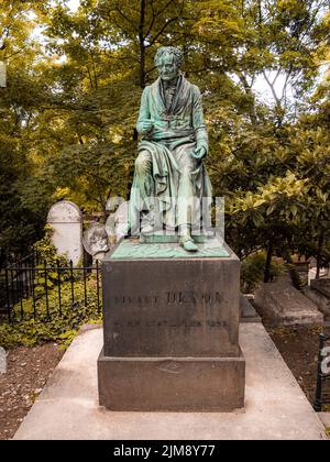 Statue on the grave of Vivant Denon in the famous Pere Lachaise cemetery in Paris, France. The cemetery is a famous tourist destination. June 6, 2022. Stock Photo