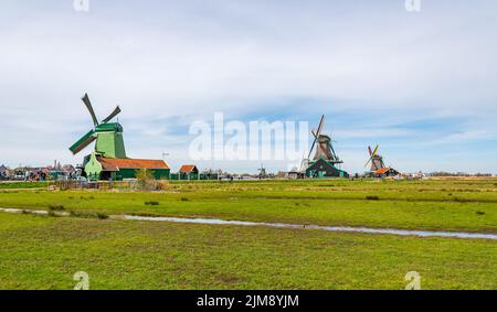 Traditional windmills over at the Zaanse Schans, cloudy weather Stock Photo