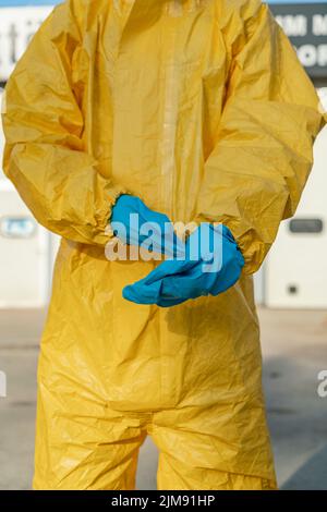 Selective focus shot of the moment when protective gloves are put on. Stock Photo