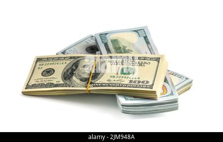 Bundles of hundred dollar bills isolated on white background. Stock Photo