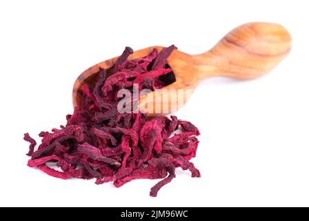 Dry beetroot in wooden scoop, isolated on the white background. Chopped dried beet Stock Photo