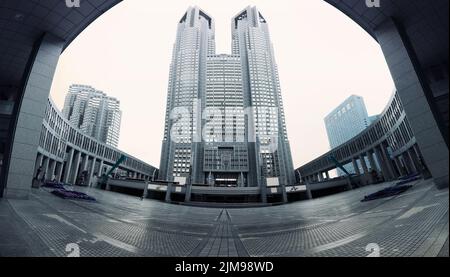 Wide angle panorama of Tokyo cityhall in dark tones Stock Photo