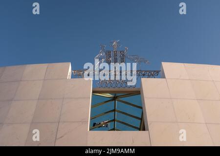 The Australian coat of arms on top of the Canberra Parliament House Stock Photo
