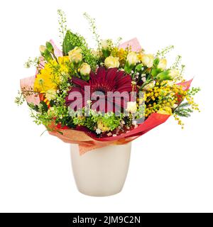 Beautiful bouquet of gerbera, carnations and other flowers in vase. Stock Photo