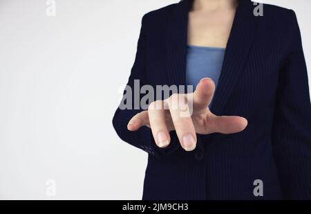 Businessman touching in empty screen, hand touching virtual screen, modern background concept Stock Photo
