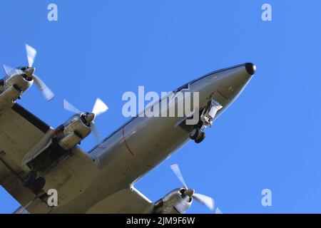 Super Constellation, Super Conny. Approach, very close from below. Landing gear. Stock Photo