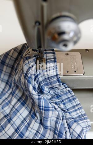 Garment sewing itself Stock Photo