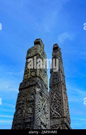 Detail Saxon Crosses isolated against blue sky in Sandbach Cheshire UK Stock Photo