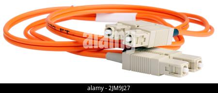 Orange optical data cable isolated on the white Stock Photo