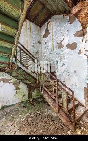 Staircase inside Trans-Allegheny Lunatic Asylum Stock Photo