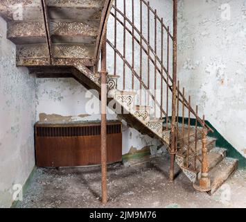 Staircase inside Trans-Allegheny Lunatic Asylum Stock Photo