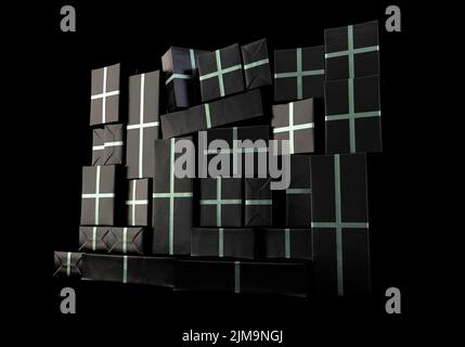 A stacked wall of different sized rectangular gift boxes wrapped in ...
