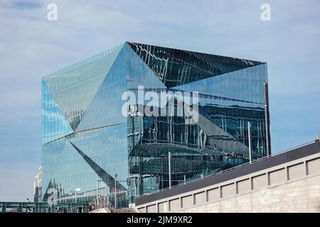 A beautiful view of a glass cube on a sunny day in Berlin, Germany Stock Photo