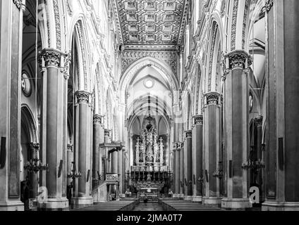 Black and white photo of nave of ancient catholic cathedral in Naples, Italy Stock Photo