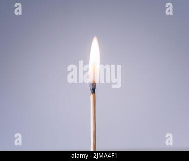 Close up of a lit wooden match. Stock Photo