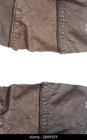 Two pieces of brown leather with a space for text isolated on white background. Stock Photo