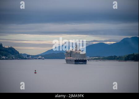 Ketchikan, Alaska - July 29, 2022: Holland America's Nieuw Amsterdam steaming into Ketchikan, Alaska. Stock Photo