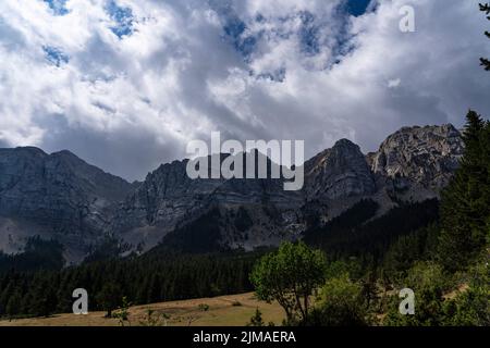 Prat de Cadi, Serra del Cadí mountain range, Catalonia, Spain, with 500 high cliffs, reaching altitudes of over 2000m. The mountains lie within the Pa Stock Photo