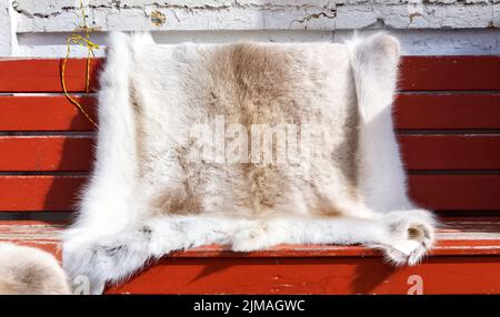 Reindeer skin on display and for sale at gift shop, Honningsvag, Norway Stock Photo