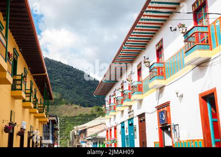 JARDIN, COLOMBIA - NOVEMBER, 2017: Beautiful houses next to the central square at the colonial town of Jardin in the Southwestern Antioquia in Colombi Stock Photo