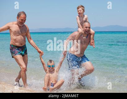 Generations Son Father Grandfather Sea Beach Vacation Stock Photo