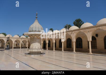 Inside the ancient mosque yard in Sanliurfa, Turkey. Mosque made of limestone. 07.11.2022. Sanliurfa. Turkey Stock Photo