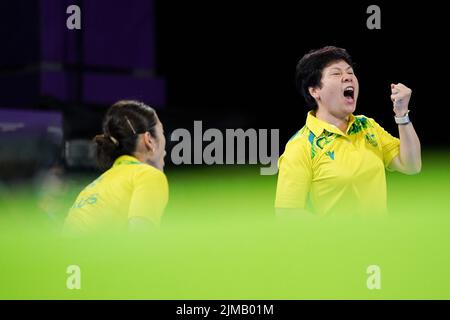 Australia's Jian Fang Lay (R) and Minhyung Jee react during Australia vs Malaysia in the women's doubles round of 32 at The NEC, on day eight of the 2022 Commonwealth Games in Birmingham. Picture date: Friday August 5, 2022. Stock Photo