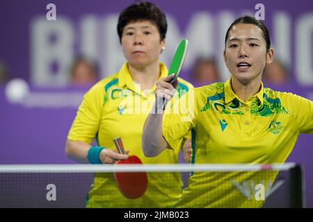 Australia's Minhyung Jee (R) and Jian Fang Lay in action during Australia vs Malaysia in the women's doubles round of 32 at The NEC, on day eight of the 2022 Commonwealth Games in Birmingham. Picture date: Friday August 5, 2022. Stock Photo