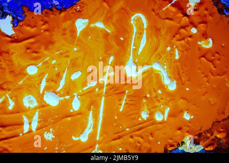 abstract orange neon paint background art effect Stock Photo