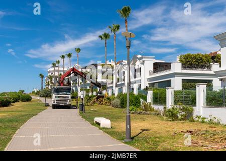 Estepona, Malaga, Spain - June 08, 2022: Beautiful luxury residential buildings on the beachfront with incredible sea views on the Costa del Sol Stock Photo
