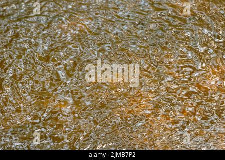Wrinkles and movement in the water Stock Photo