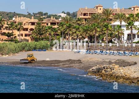 Estepona, Malaga, Spain - June 10, 2022: Beautiful luxury residential buildings on the beachfront with incredible sea views on the Costa del Sol Stock Photo