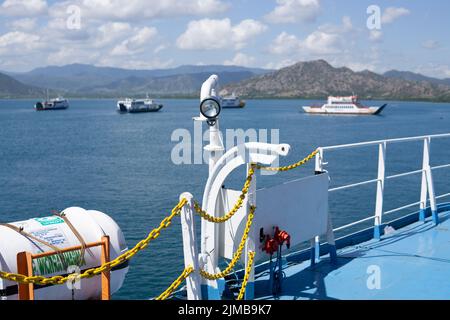 Poto Tano, West Sumbawa, Indonesia - July 9, 2022: ASDP ferry ships that are leaning on the Pototano harbor ready to depart Stock Photo