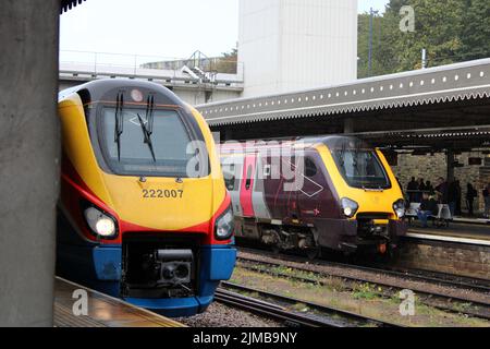 A shot of an East Midlands Railway & CrossCountry train waiting on platforms at a railway station in Sheffield, South Yorkshire, England Stock Photo
