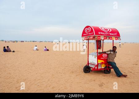 A young man selling ice-cream on Marina beach in Chennai. Stock Photo