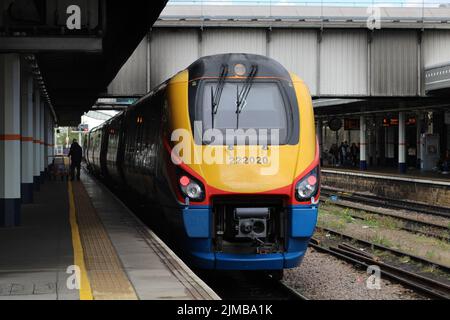 A shot of an East Midlands Train waiting on a platform at a railway station in Sheffield, South Yorkshire, England Stock Photo