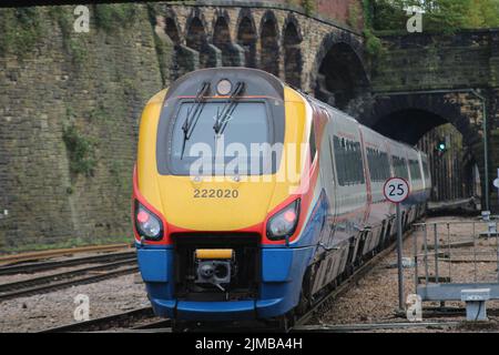 A closeup shot of an East Midlands Railway train departing a railway station in Sheffield, South Yorkshire, England Stock Photo