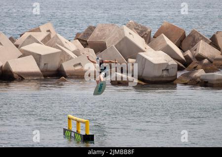 Imagin Extreme summer sports events, Barcelona. Various extreme sports on water and land Stock Photo