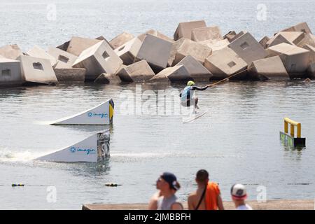 Imagin Extreme summer sports events, Barcelona. Various extreme sports on water and land Stock Photo