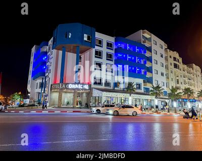 The exterior of hotel La Corniche in Fnideq at night Stock Photo