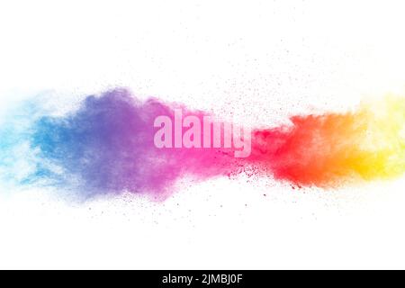 Multicolored powder explosion on white background.Colorful dust splatter on white background. Stock Photo