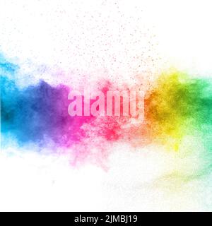 Multicolored powder explosion on white background. Color dust particle splashing. Stock Photo