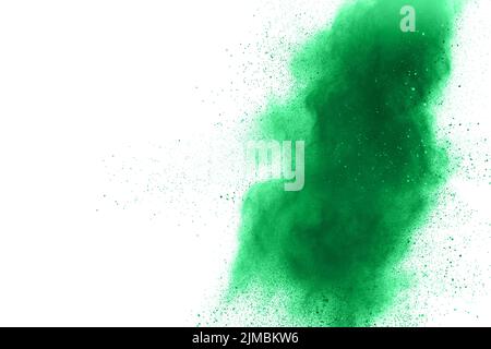 Green powder explosion on white background. Green dust splash cloud on background. Stock Photo