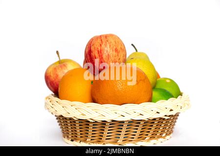 Closeup Image Of Tasty Fruits In Wooden Basket. Background White Stock Photo