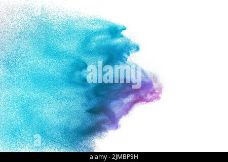 Holi powder Festival.Green color powder explosion cloud on white background. Green dust splash. Stock Photo