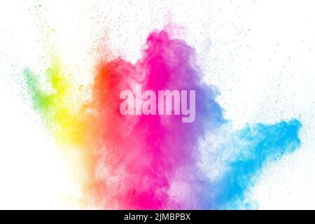 The explosion of colorful holi powder. Beautiful rainbow color powder fly away.The cloud of glowing Stock Photo